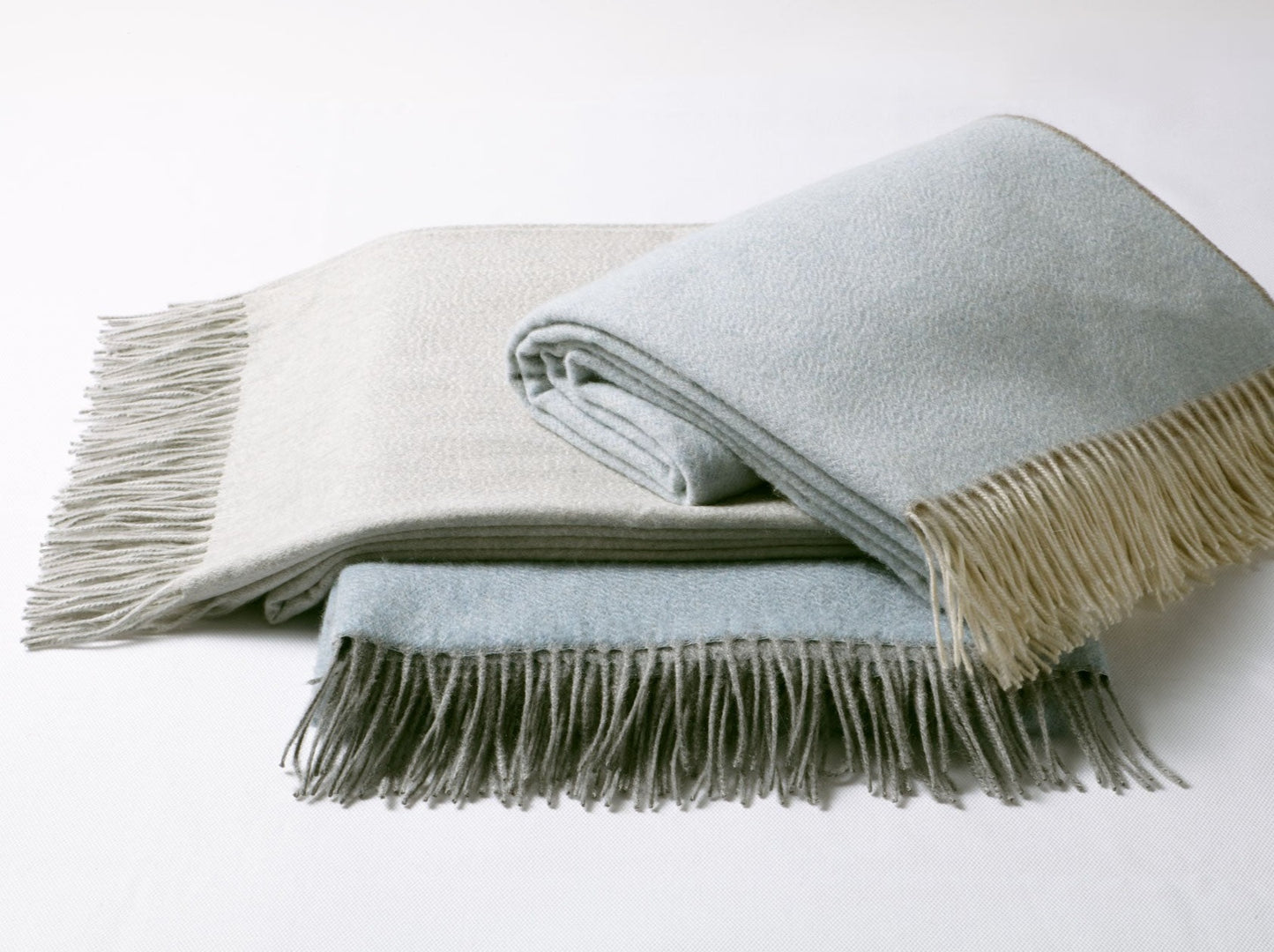 FRINGED CASHMERE THROWS